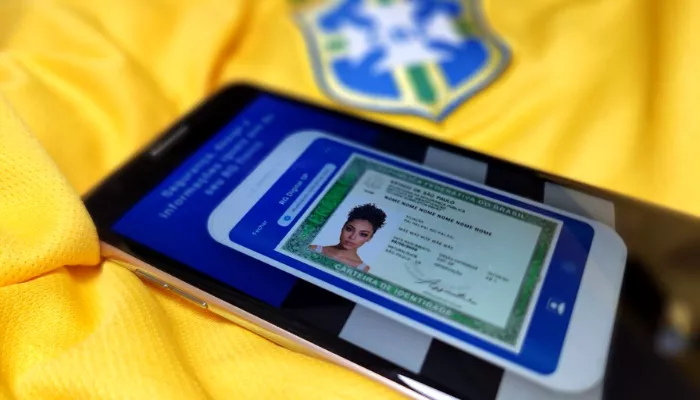 Identidade Digital ao fundo do Escudo do Brasil